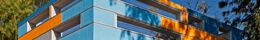 Colorful modern building representing urban climate transitions